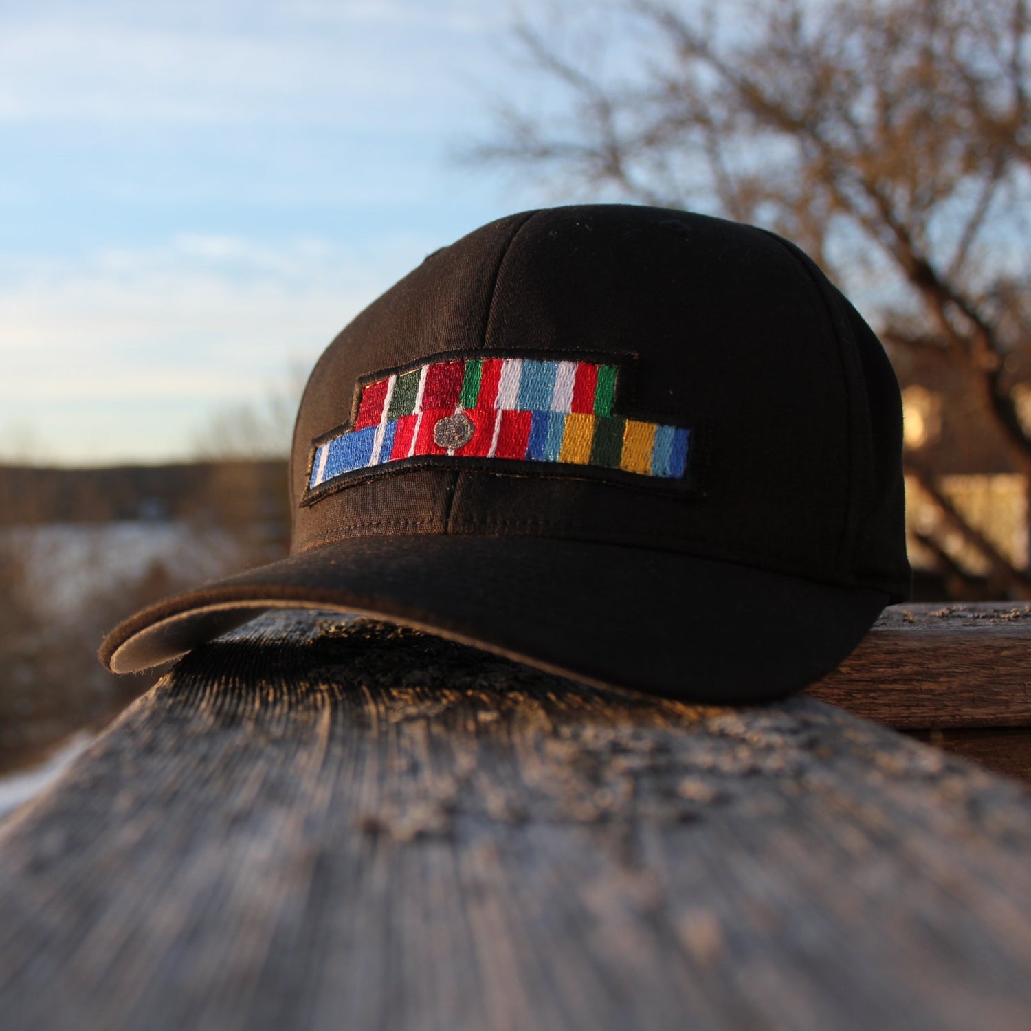 Your Embroidered Medal Patch on a Flexfit Ball Cap